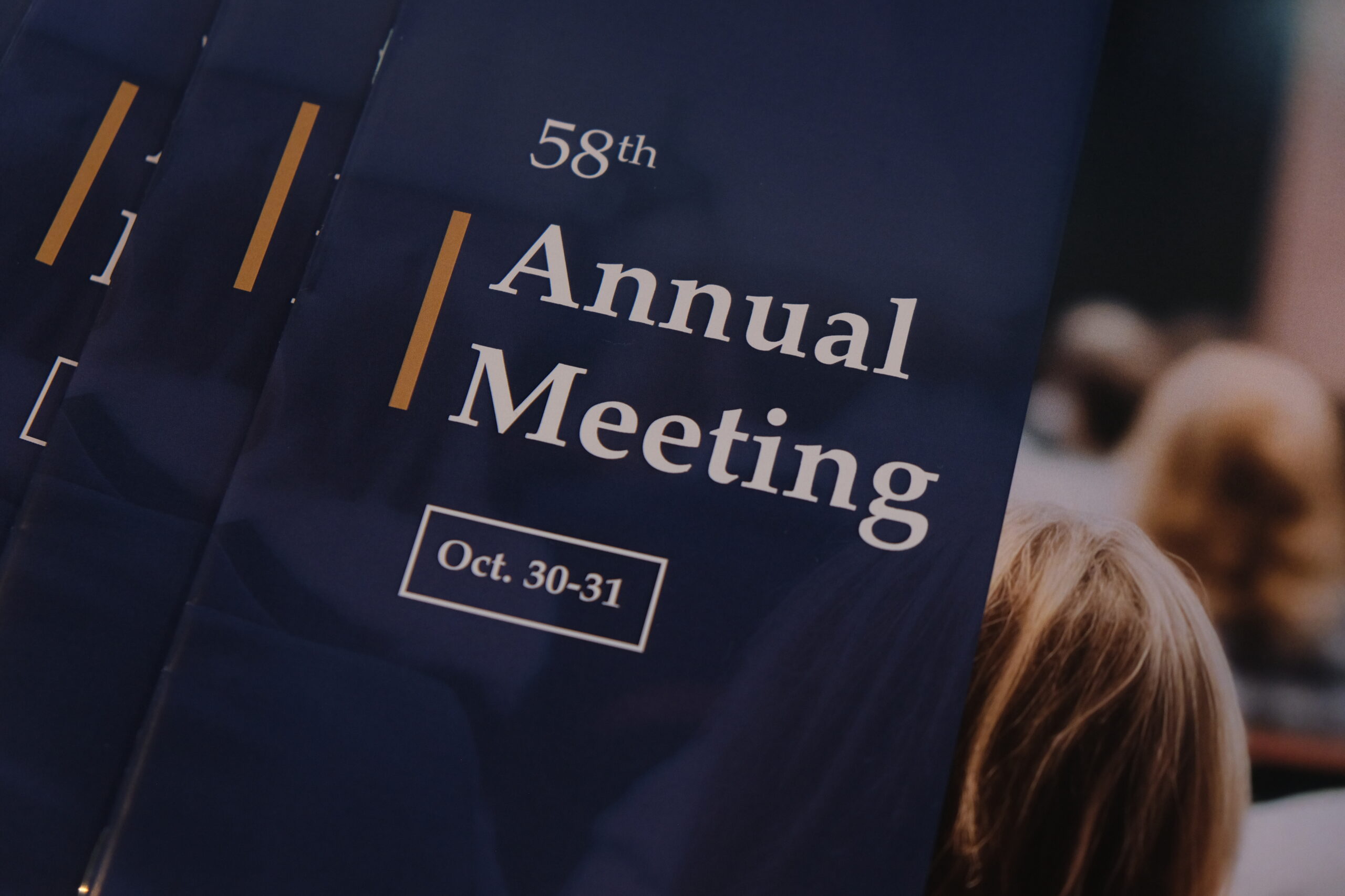 Cover of Annual Meeting book.