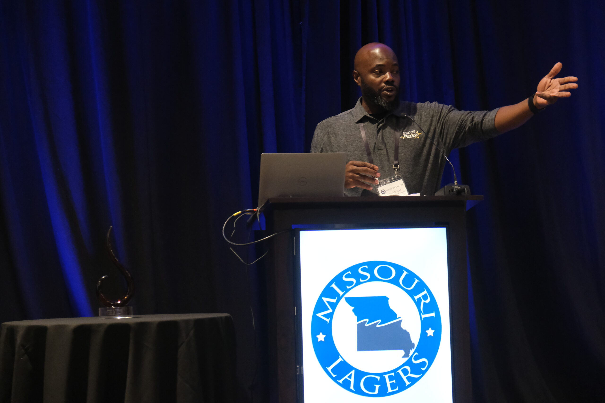 Andre Williams on stage accepting the Local Government Hero Award.