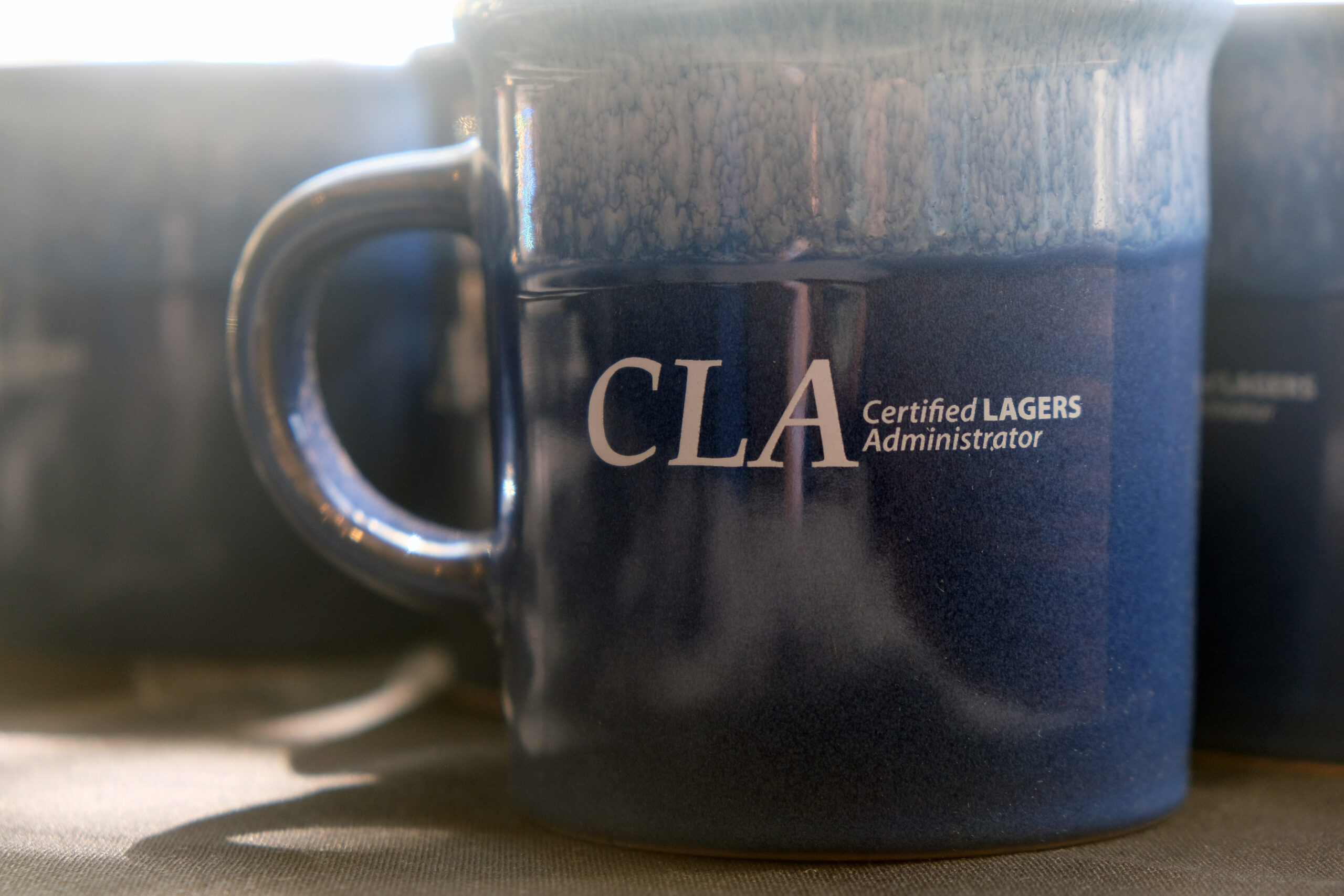 Image of CLA mugs awarded to Certified LAGERS Administrators.