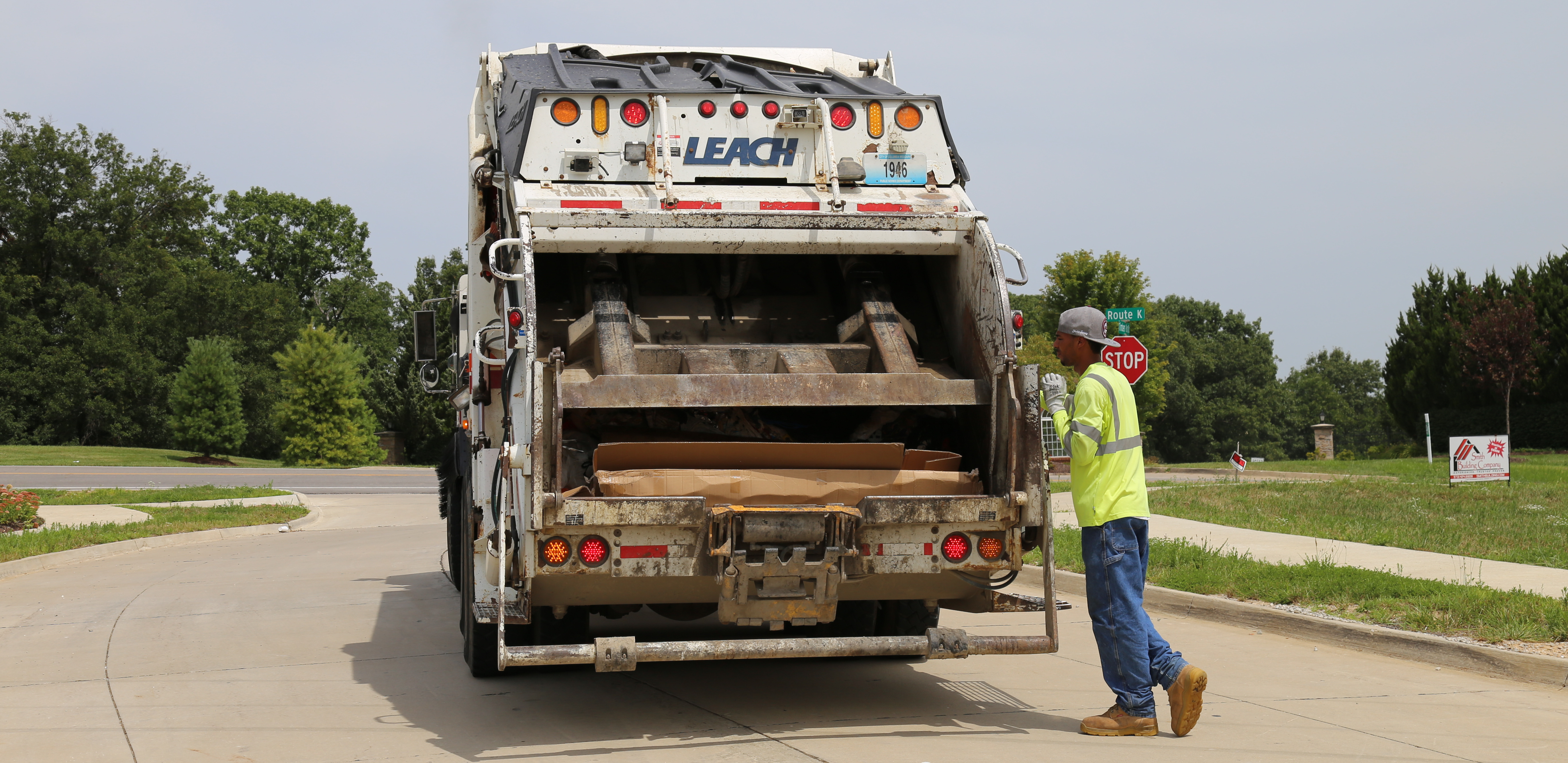 Columbia sanitation workers running their weekly routes