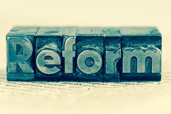 the word "reform" in lead letters written. symbolic photo for quick correspondence